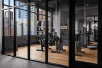 Level 3 - State-of-the-art fitness center featuring a private spin room and a full range of premium equipment for every workout style.