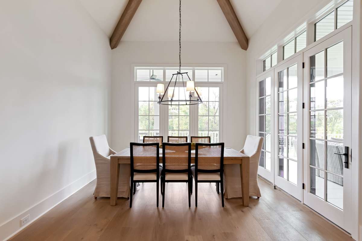 Dining Room has a stately vault and gorgeous floor-to-ceiling windows,