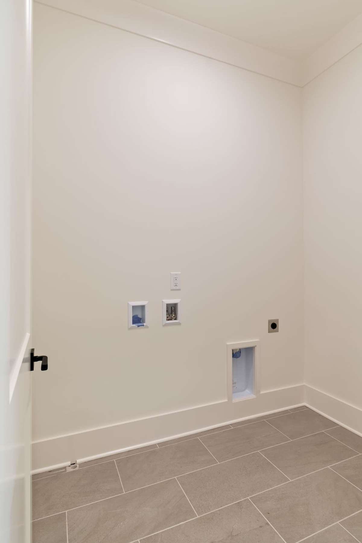 Upstairs laundry room - second laundry location in the home