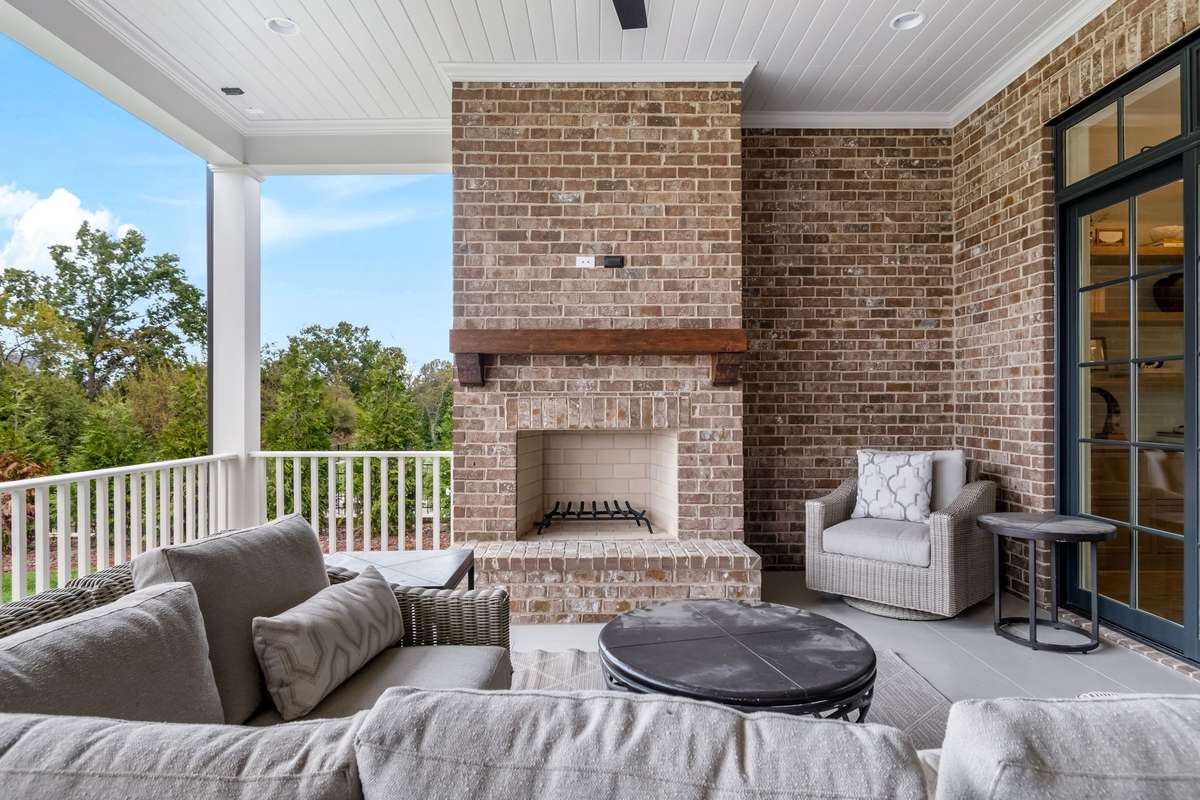 Enjoy all-year-round on the covered back porch located right off of the Great Room on the main level.