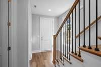 A look toward the front door from the foyer.