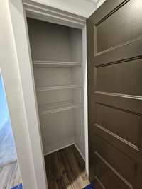 downstairs guest bath linen closet