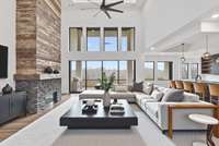 Step into the heart of this exquisite home and be welcomed by the breathtaking open great room, where modern sophistication meets the warmth of home.