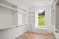 Experience the ultimate in organization and luxury with a large walk-in closet designed to accommodate even the most extensive wardrobe.