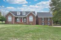 All brick home on 1 acre lot close to everything