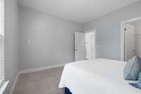 Main Floor Bedroom with Walk-In Closet and Full Bath