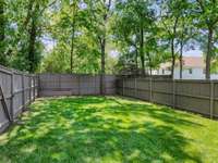 Private, fully-fenced back yard