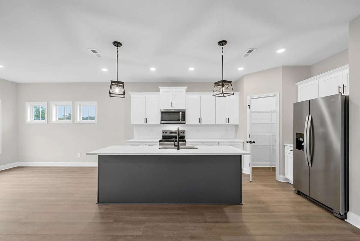 Example photo of home to be built- Color, styles and upgrades may vary