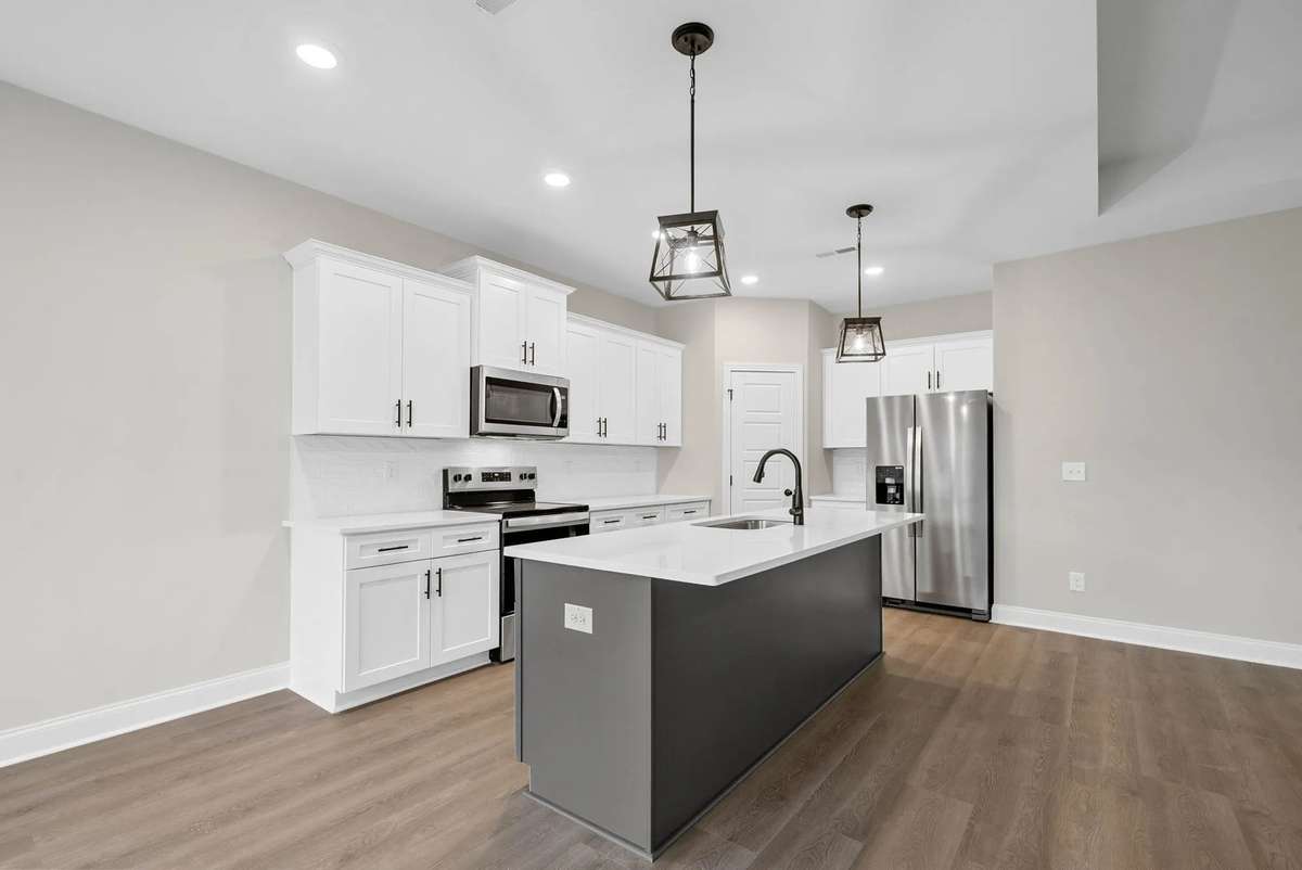 Example photo of home to be built- Color, styles and upgrades may vary