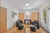 This bedroom on the main floor has a full ensuite attached bath and also has two hideaway beds, which allows this room to also easily be converted to a formal office or additional living space.