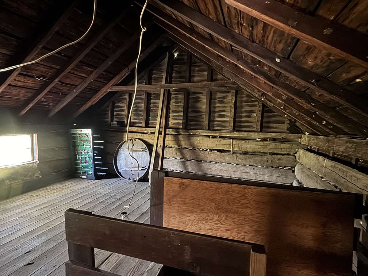 Upstairs, old logs, perfect for a writing room