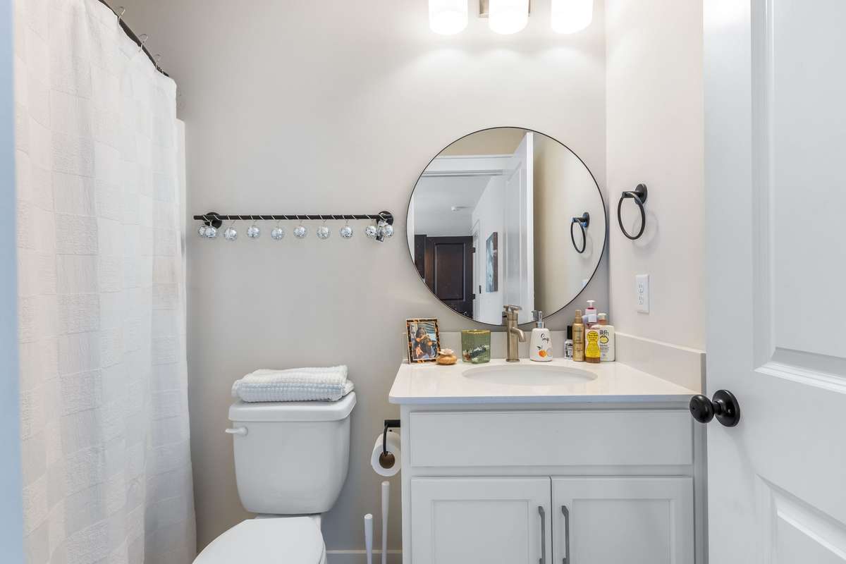 Private bathroom off of that guest room... Lovely isn't she? Neutral and ready for a splash of your personality.