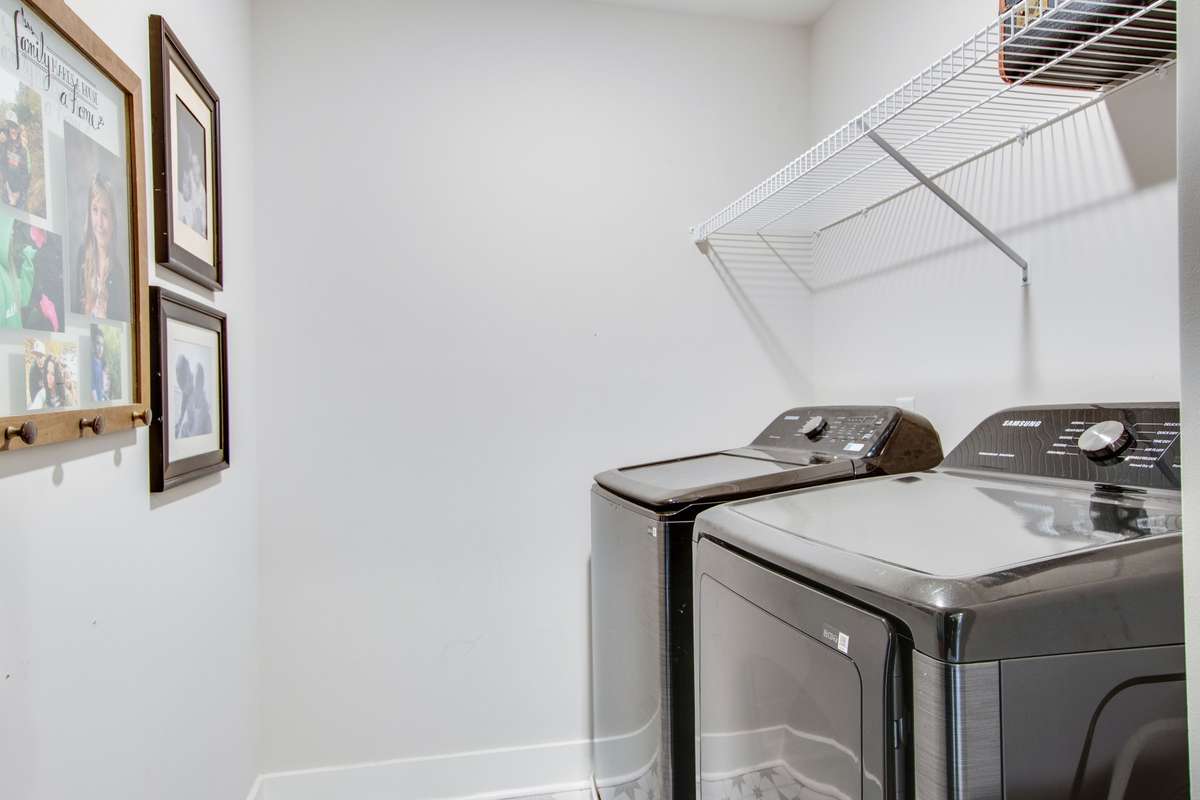 The laundry room is located on the second floor... Yes that is right... Where all of your clothes are. No hauling laundry up and down the stairs. Check out this beautiful tile floor when you come tour the home.