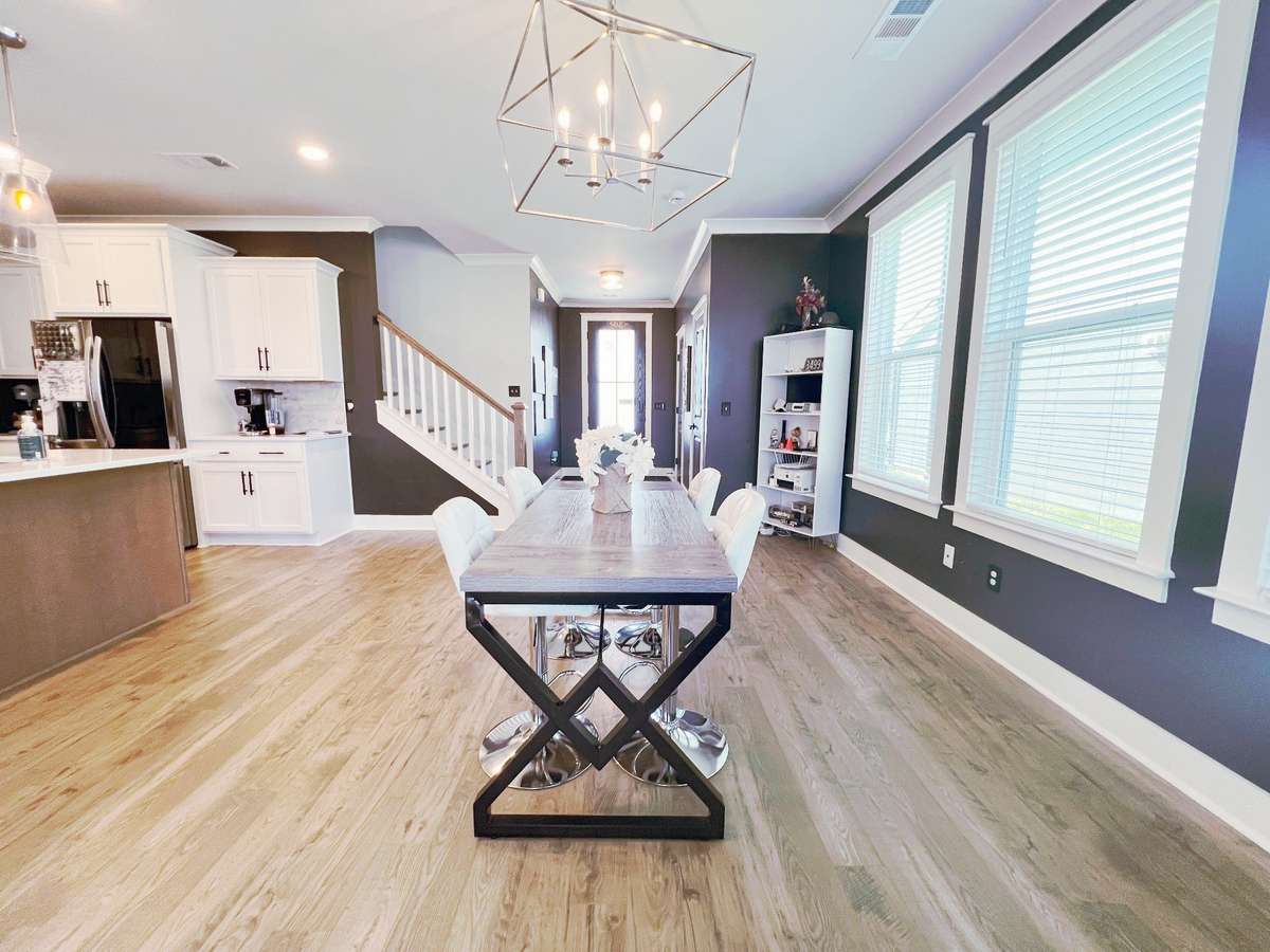 Spacious dining room offers plenty of room for a large farmhouse table...