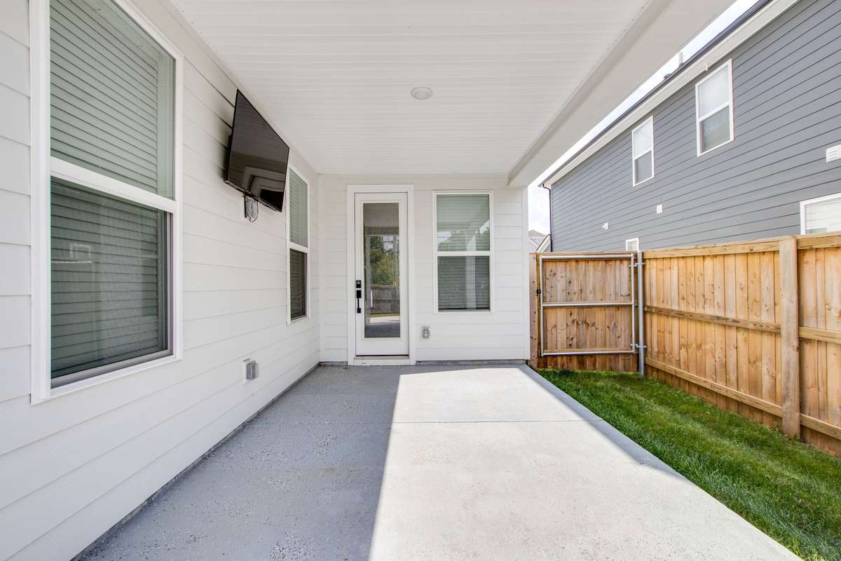 Covered back patio has a mounted television which will remain... there is a gas stub out located on the side of the patio that is perfect for your gas grill or a patio fireplace.