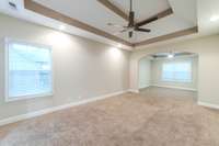 Who doesn't want space for a sitting area in their primary suite?!