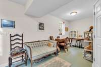 At the bottom of the stairway linking upper and lower living areas has a rustic charm.