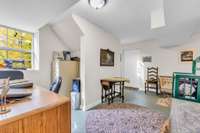 Open landing space offers a perfect nook for reading or a small workspace.