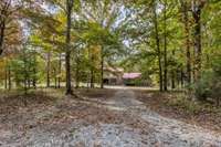 Expansive front yard offering endless possibilities for gardening, outdoor entertaining, or future enhancements.