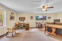 The very spacious second bedroom suite on the upper level is so large, it's currently being used as a office and media room.