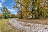 The driveway feels like your own charming country lane as you make your way to the home.