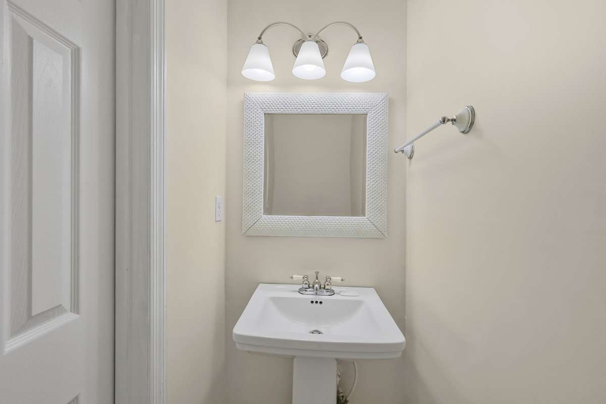 Convenient main level powder room for guests and everyday use.
