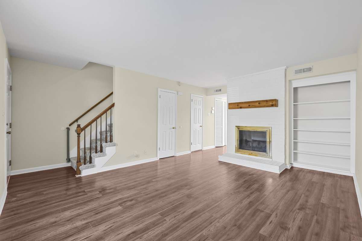 Another look at the inviting living room with plenty of space to relax or entertain.