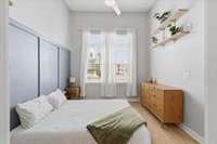 There is a ceiling fan in the bedroom and living room