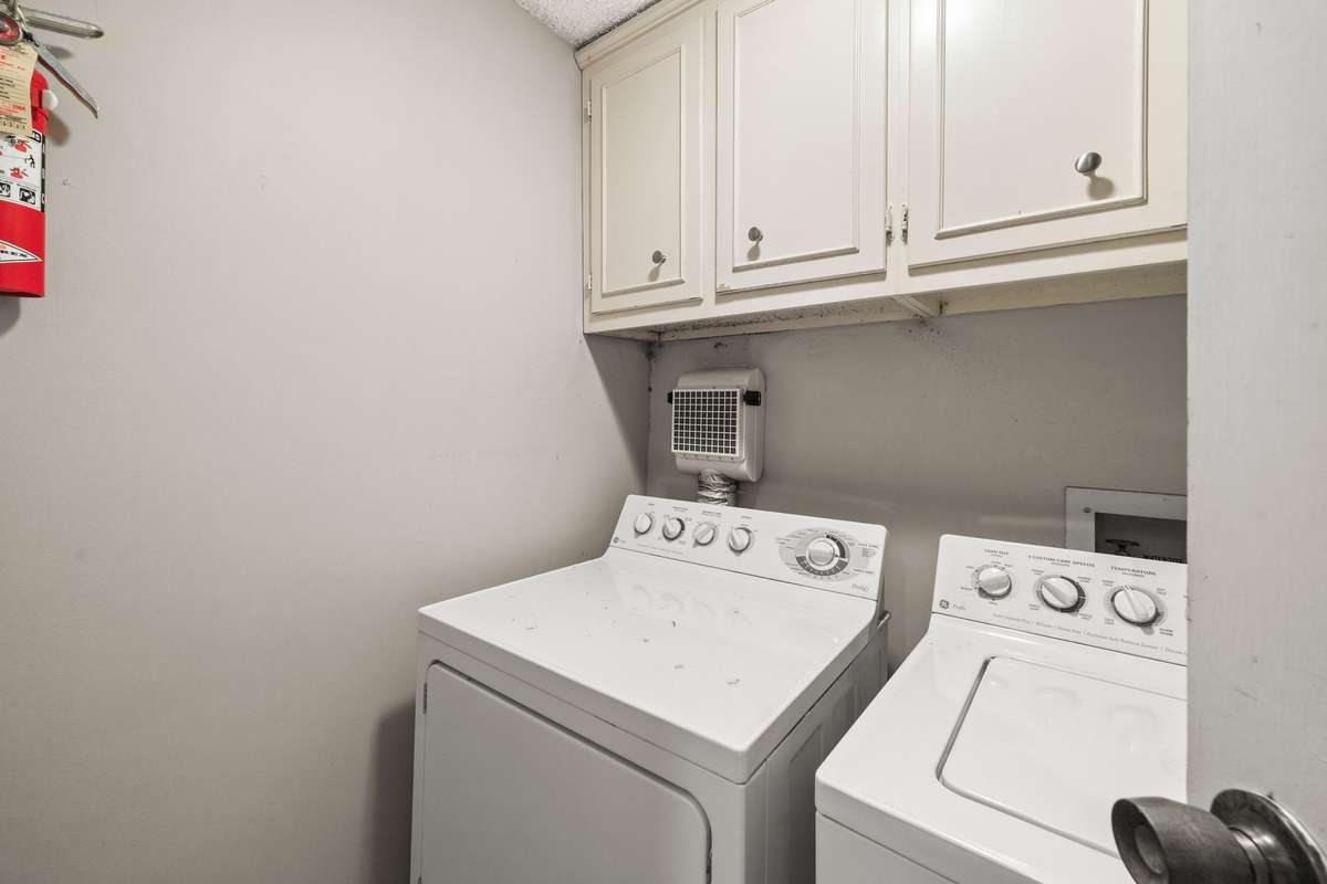 Utility Area with Cabinets! Washer and Dryer to remain!