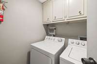 Utility Area with Cabinets! Washer and Dryer to remain!