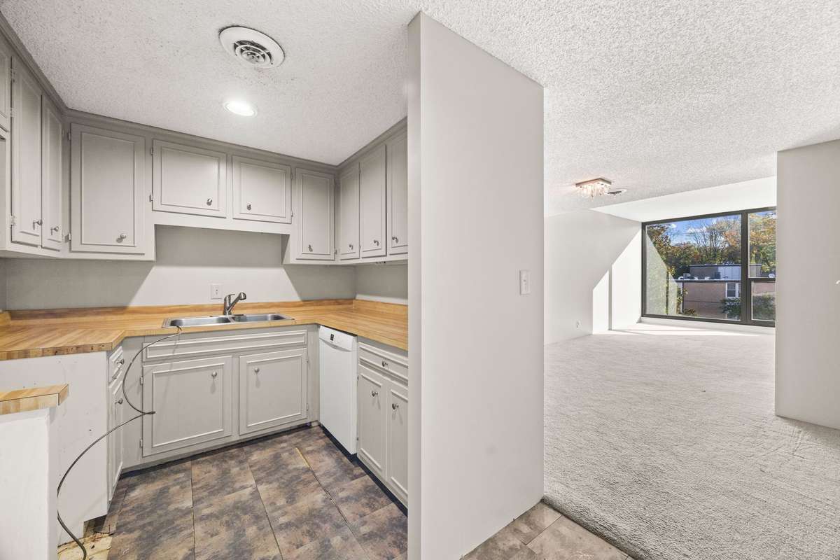 Kitchen looking into the Dining Room then Living Room.  Bring All Offers!