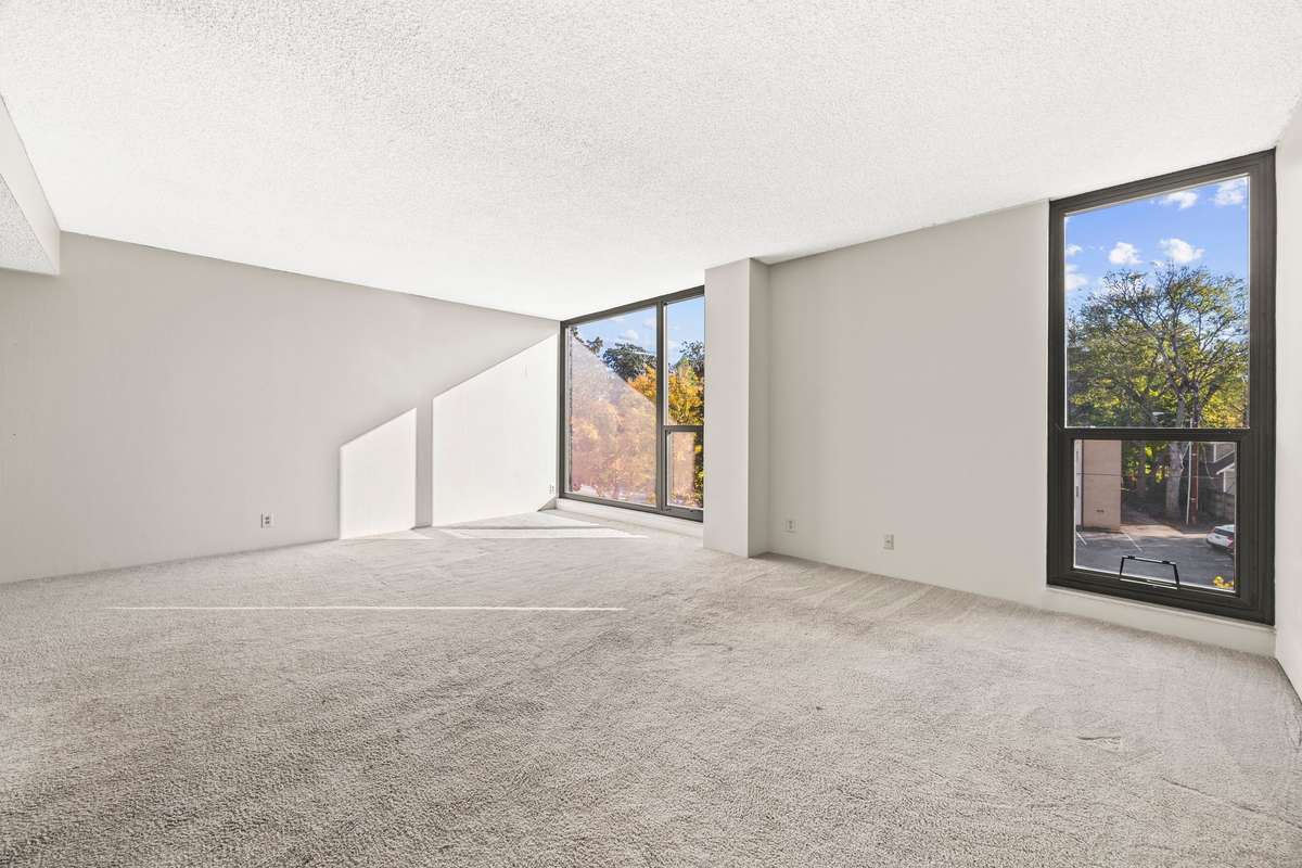 Light Filled Large Living Room in your 1 Bedroom / 1.5 Bath Condo!