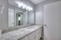 New sink, fixtures, and countertops in this spacious bathroom!