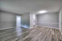 Freshly painted, with new floors. The unit is currently vacant.