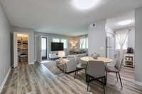 Another virtual view, looking from the front door, into the open space of this unit.