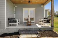 *COVERED BACK PORCH WITH THE CEDAR CEILING, CEILING FAN AND THE SUNSET VIEWS ARE STUNNING!*