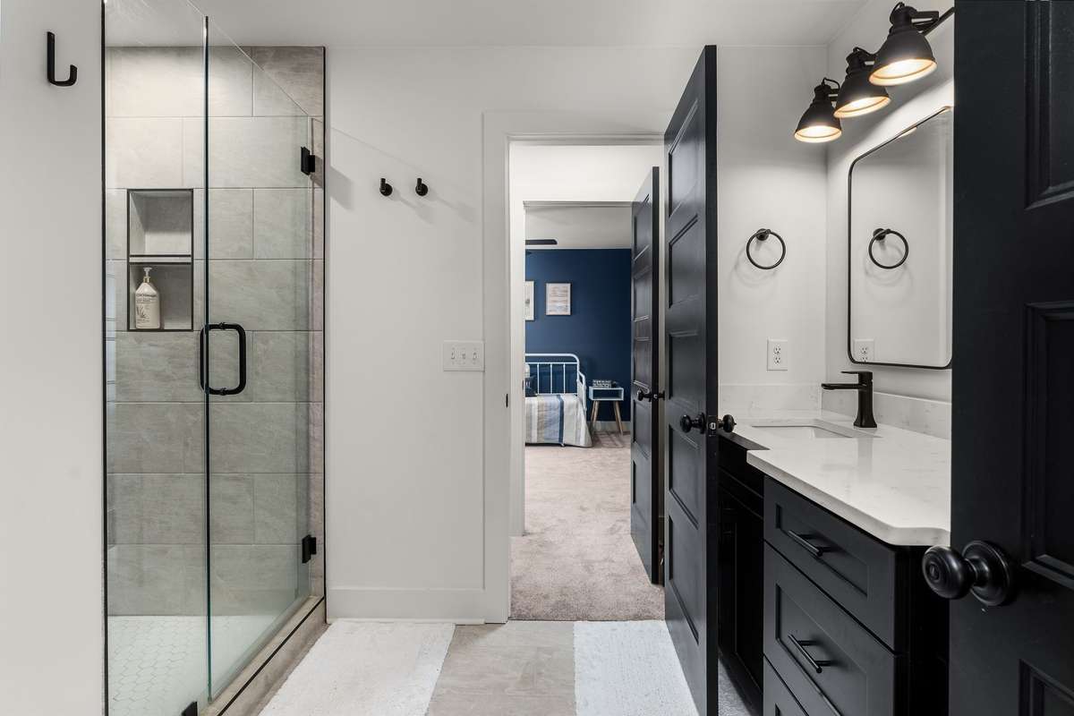 *JACK N JILL BATHROOM WITH TILE SHOWER AND DOUBLE VANITIES*