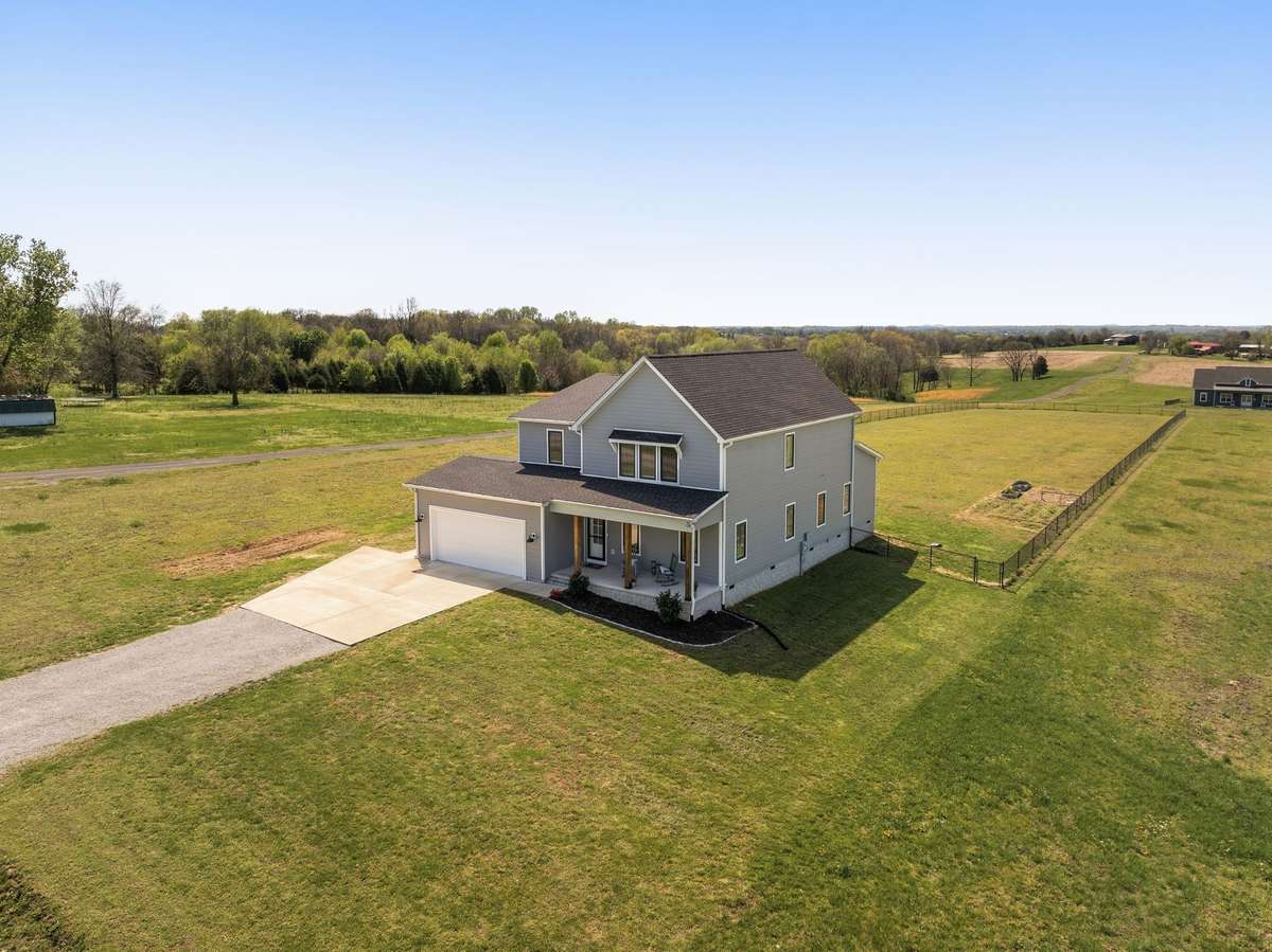*EXTRA CONCRETE PARKING TO PARK YOUR RV/TRAILER/BOAT* SELLER ADDED EXTRA SPIGOT AND 50 AMP TO BETTER EQUIP A PARKED RV* TANKLESS WATER HEATER IN GARAGE*