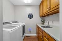 Upstairs Laundry Room with extra storage
