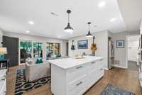 Basement Level Seating area (or dining room) with custom kitchen and patio access