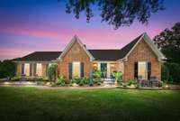 Gorgeous all brick home with walk-out finished basement