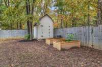 Raised beds and storage barn convey