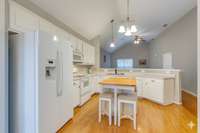 Kitchen has a fantastic work triangle, while also being open to family and friends (Some photos have been adjusted for staging purposes.)