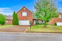Welcome home to one-level living, with a bonus room upstairs. (Some photos have been adjusted for staging purposes.)