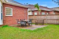 Additional back patio. (Some photos have been adjusted for staging purposes.)