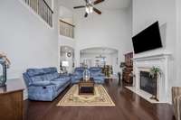 Soaring 22' Ceilings and open concept with gas fireplace