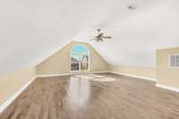 This versatile space is bright, airy, and ready to adapt to your lifestyle - gym, playroom, or movie nights!