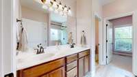 Primary bath with oversized shower, double sinks, separate water closet, and huge walk in closet!