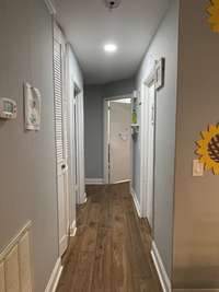 Hallway to Full Bathroom and Bedrooms