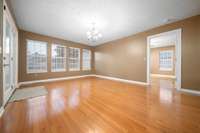 Spacious dining room offering plenty of room for a large table and comfortable seating.